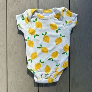 Hanna Andersson lemon baby bodysuit